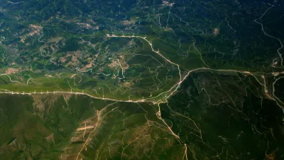 a satellite image of the countryside in Portugal, dotted with wind turbines