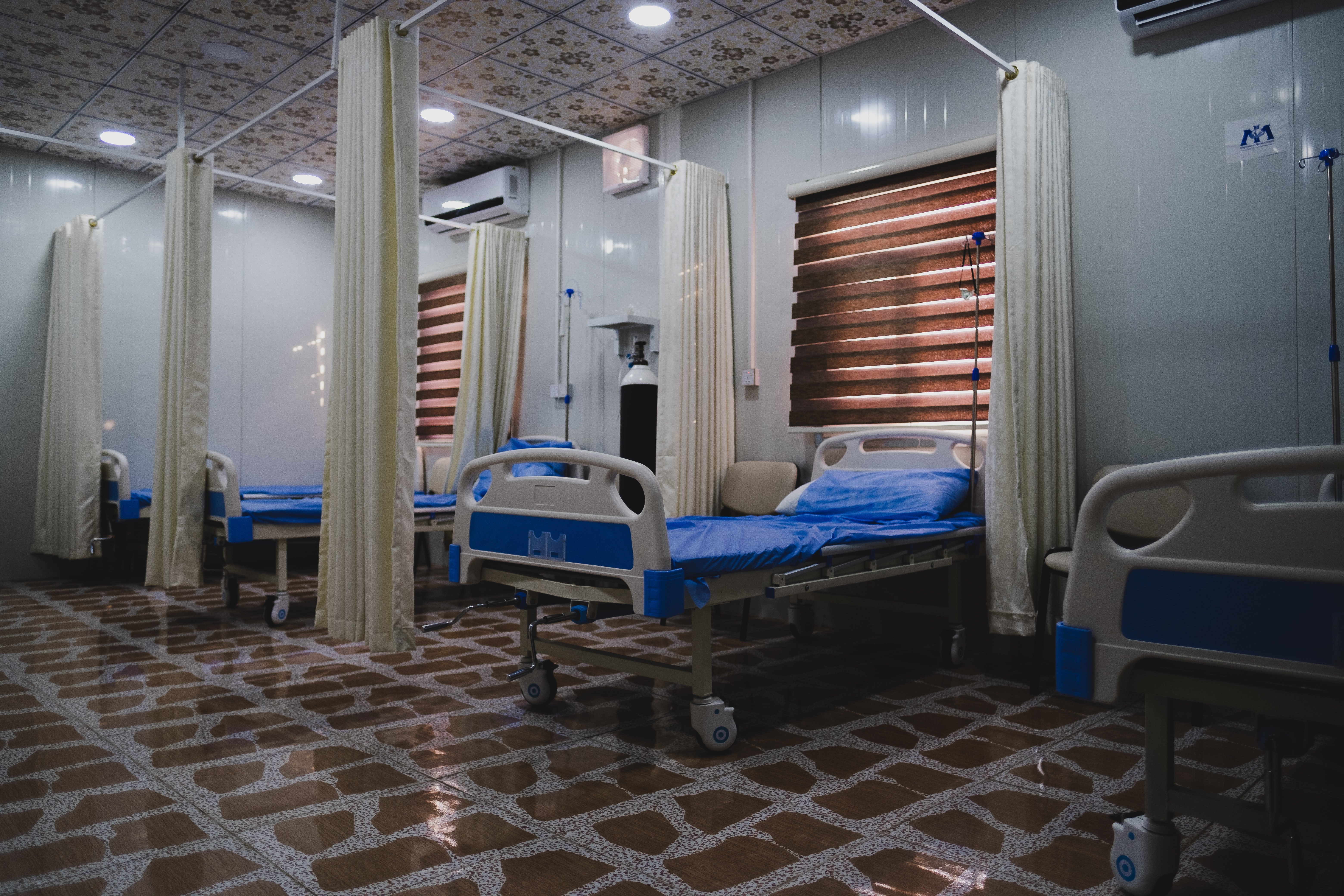 Row of empty hospital beds