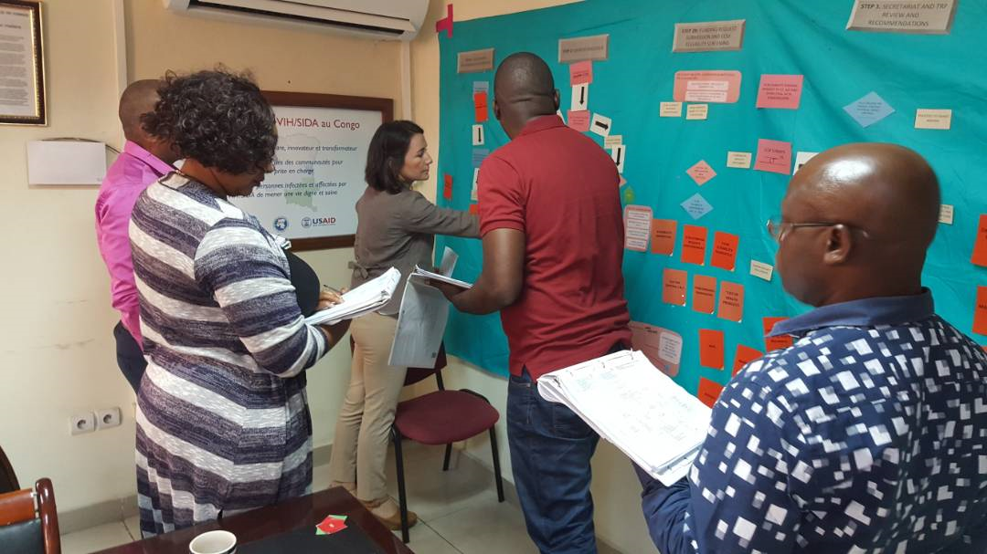 Researchers map concepts on a board in the Democratic Republic of Congo