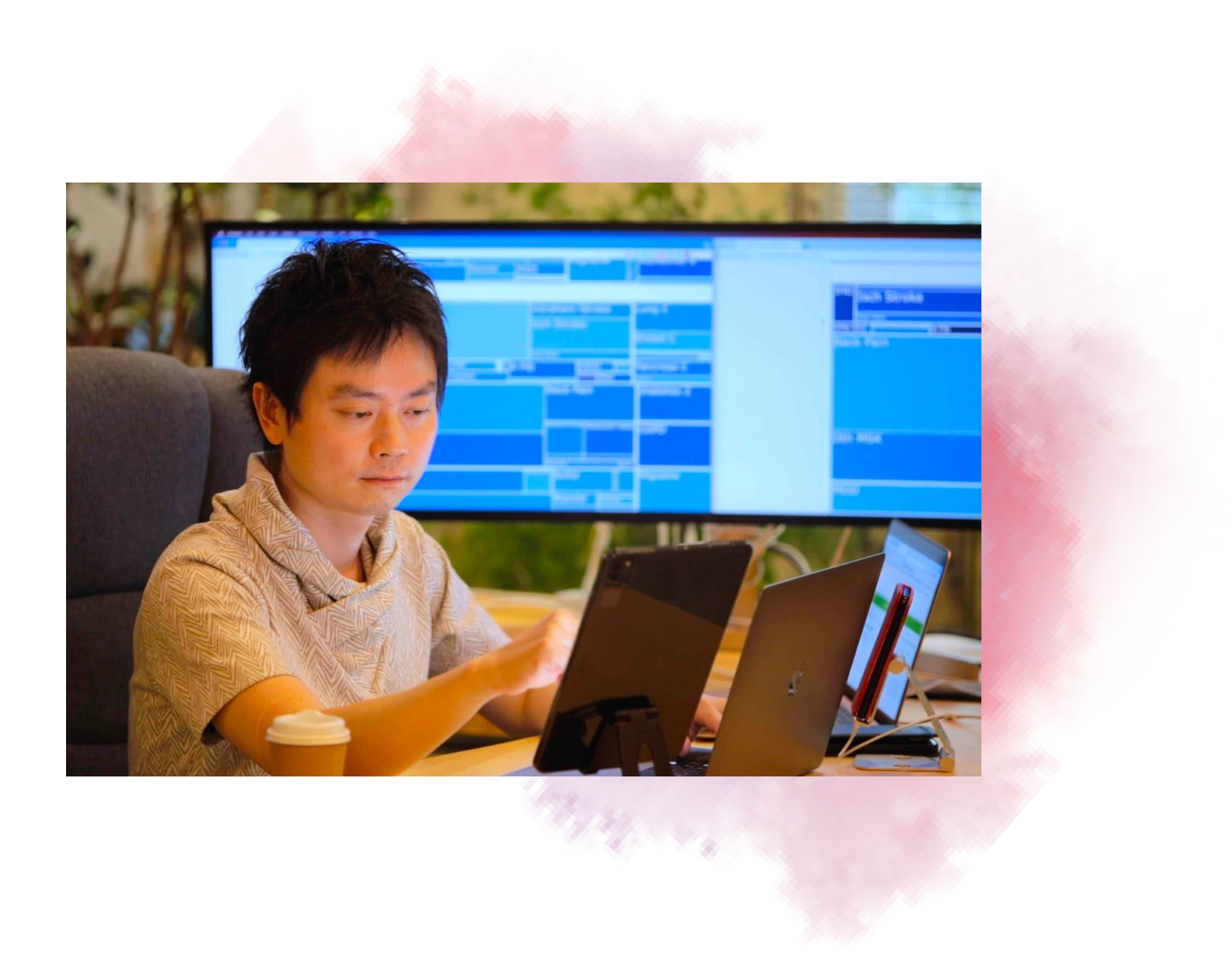 Dr. Nomura sits in an office with computer screen displaying GBD Compare visualization tool