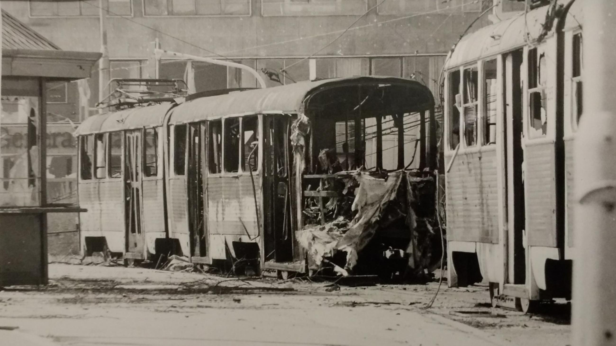 Black & white image of shelled trams in Sarajevo, Bosnia and Herzegovina, in 1992