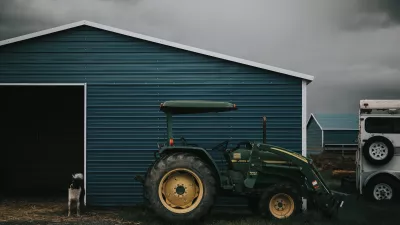 tractor outside a barn