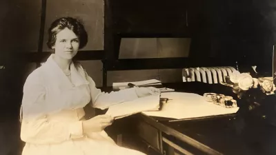 vintage portrait of Mary Dempsey at her desk