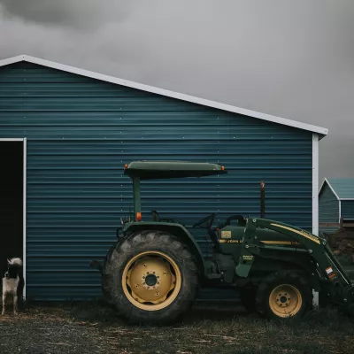 tractor outside a barn