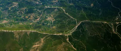 a satellite image of the countryside in Portugal, dotted with wind turbines