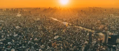 smoggy sunset over a large city