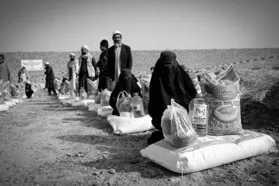 women give humanitarian aid
